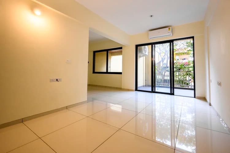 Bedroom with balcony door and city view