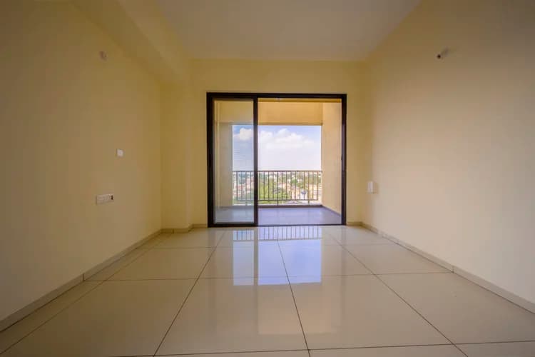 Bright living room opening to a balcony