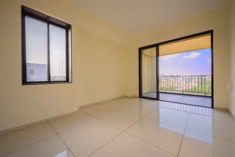 Living room with sliding glass balcony door