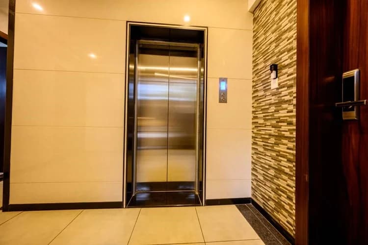 Staircase with wooden door accents